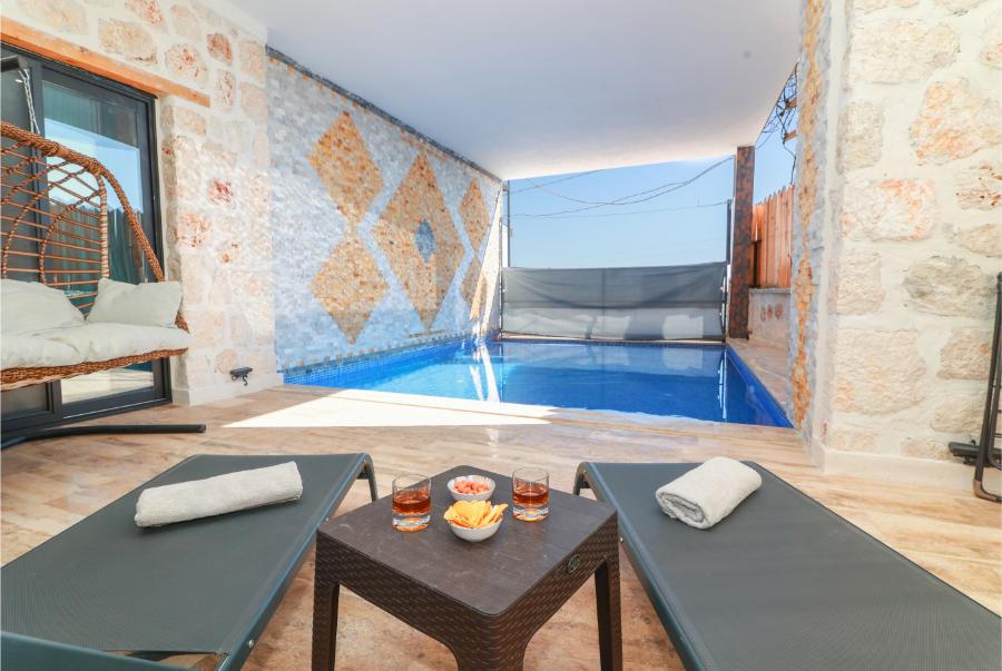 Kalkan Akbelde 1+1 Özel Havuzlu Deniz Manzaralı Kiralık Lüks Villa DRM-1869